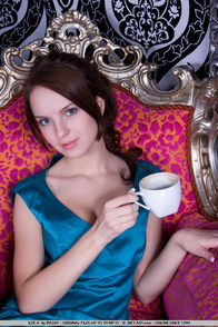 Teen with only an orange necklace on - 00