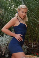 Kristina outdoors playing with her toy - 00